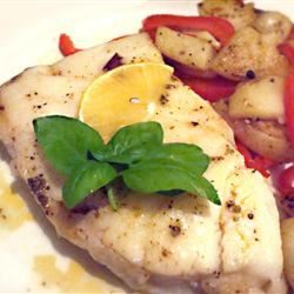Slashed Sea Bass with Red Onions, Mushrooms, and New Potatoes