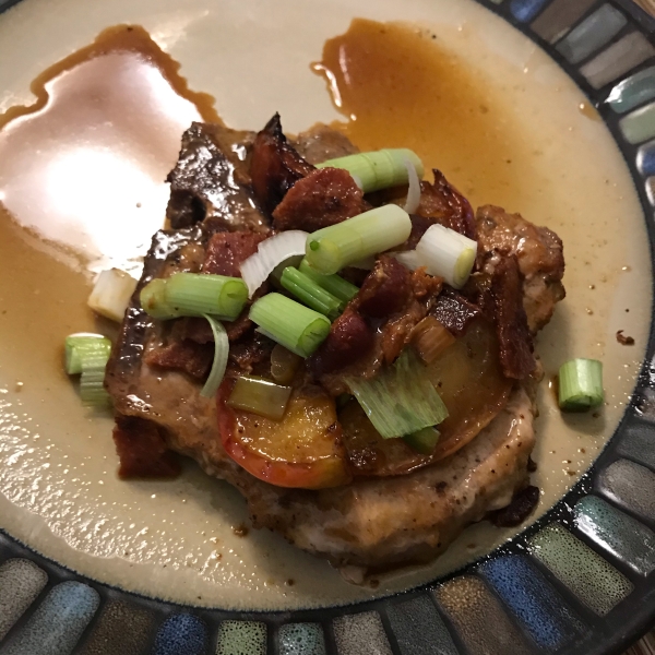 Pan Seared Pork Chops Topped with Brown Sugar Glazed Apples and Bacon
