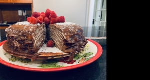 Chocolate Crepe Cake with Salted Chocolate Orange Sauce