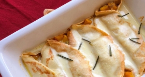 Pumpkin Crepes with Fontina Cheese Sauce