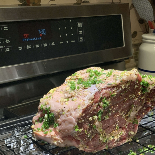 Boneless Garlic and Rosemary Rubbed Prime Rib with Red Wine Mushroom Sauce