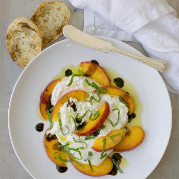 Peaches with Burrata, Basil, and Raspberry Balsamic Syrup