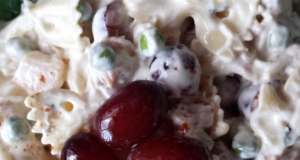 Creamy Bow Tie Pasta Salad with Prosciutto, Peas, Grapes, and Dried Cranberries