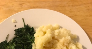 Cumin Lamb Steaks with Smashed Potatoes, Wilted Spinach and Red Wine Sauce