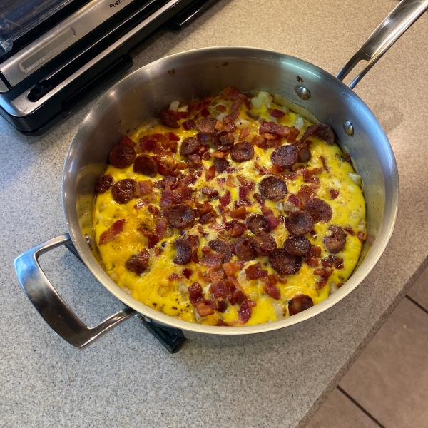 Cheesy Bacon-Sausage-Egg-Hash Brown Skillet