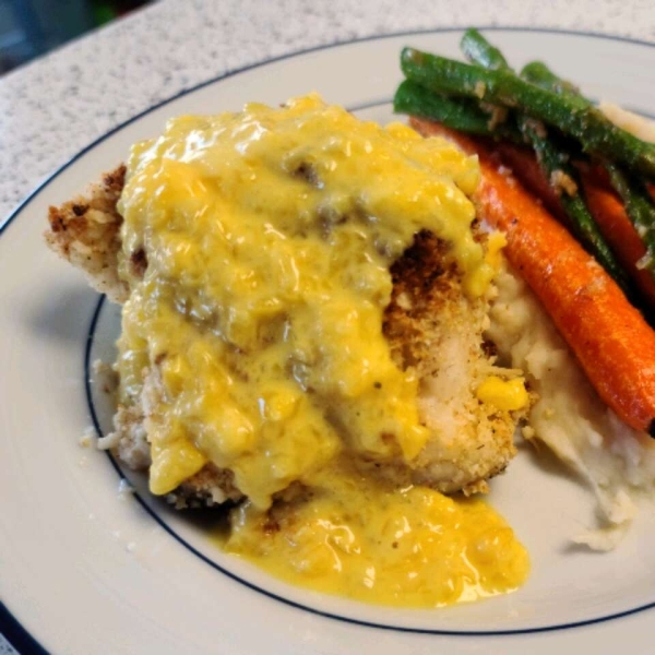 Macadamia-Crusted Sea Bass with Mango Cream Sauce