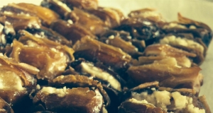 Roasted Dates Stuffed with Pine Nuts in Honey