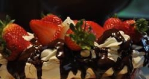 Meringue Cake with Whipped Cream and Raspberries