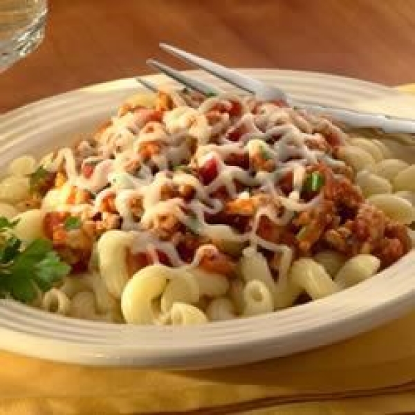 Cavatapi with Chicken Ragu, Mozzarella and Basil