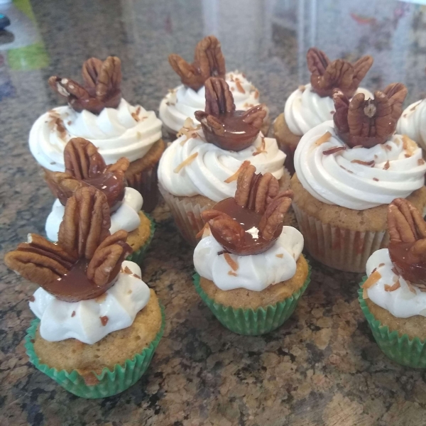 Hummingbird Cupcakes with Cream Cheese-Maple Frosting and Praline Topper