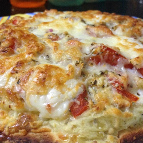 Cheesy Breakfast Pizza