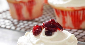 White Chocolate-Cranberry Poke Cupcakes