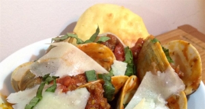 Clams and Sausage in Spicy Marinara with Crostini