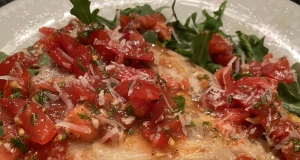 Parmesan Black Cod with Arugula and Tomato Topping