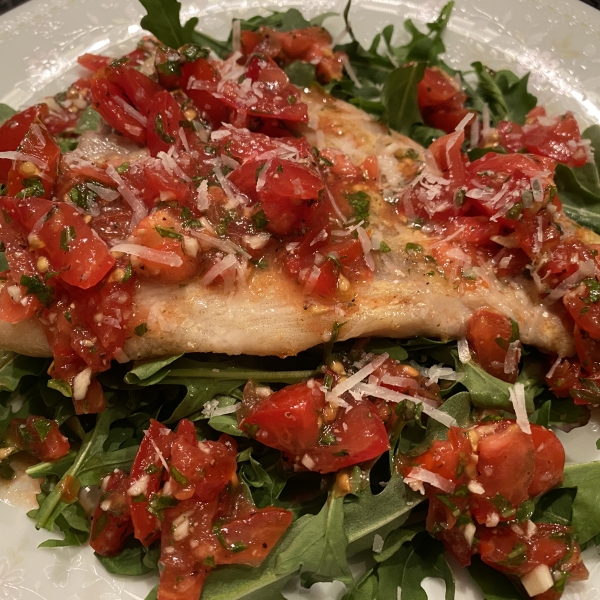 Parmesan Black Cod with Arugula and Tomato Topping