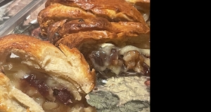 Baked Stuffed Brie with Cranberries & Walnuts