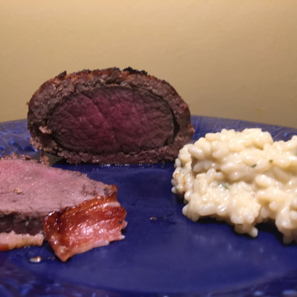 Bacon-Wrapped Venison Tenderloin with Garlic Cream Sauce
