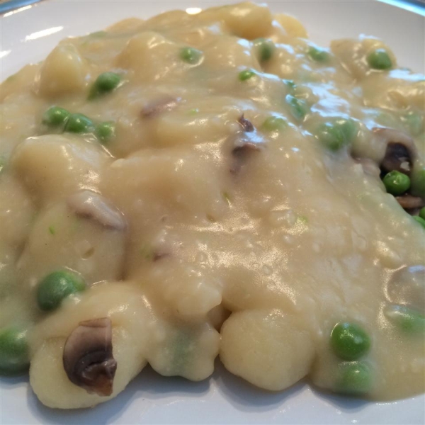 Ricotta Gnocchi with Fresh Peas and Mushrooms