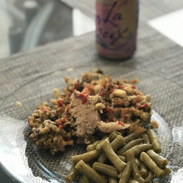 Stuffed Pork Roast with Herb Seasoned Artichoke & Mushroom Stuffing