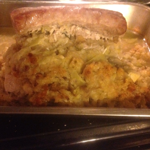Stuffed Pork Roast with Herb Seasoned Artichoke & Mushroom Stuffing