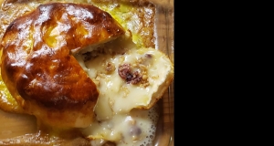 Baked Stuffed Brie with Cranberries & Walnuts