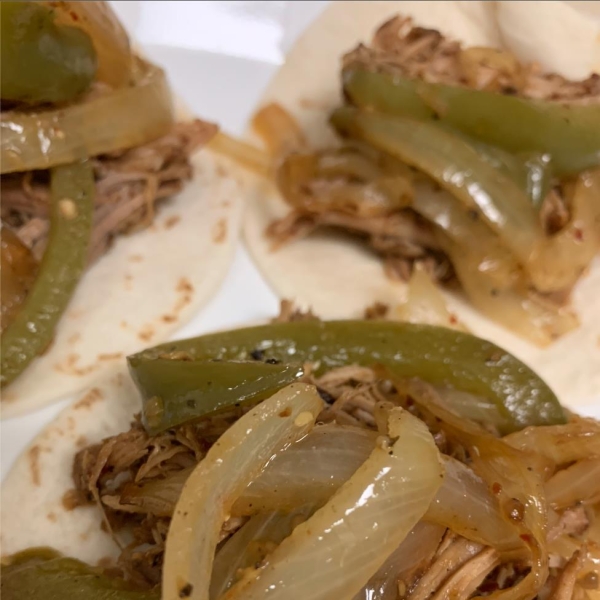 Instant Pot® Brisket Barbacoa with Poblano Peppers and Onions