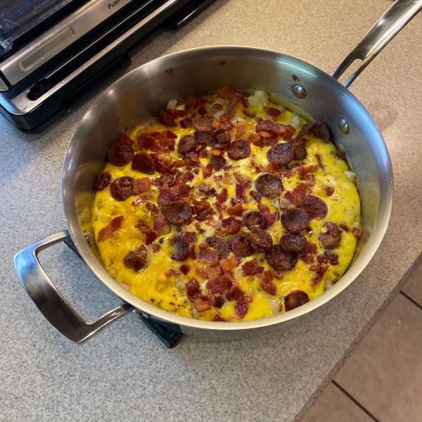 Cheesy Bacon-Sausage-Egg-Hash Brown Skillet