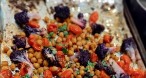 Easy Vegan Sheet Pan Roasted Cauliflower, Tomatoes, and Garbanzo Beans