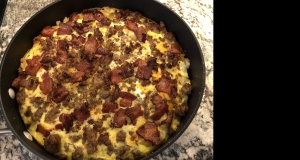 Cheesy Bacon, Sausage, and Egg Hash Brown Skillet
