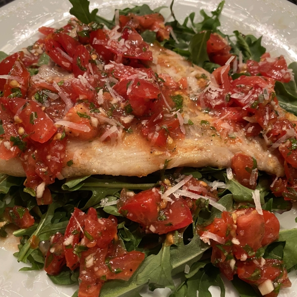 Parmesan Black Cod with Arugula and Tomato Topping