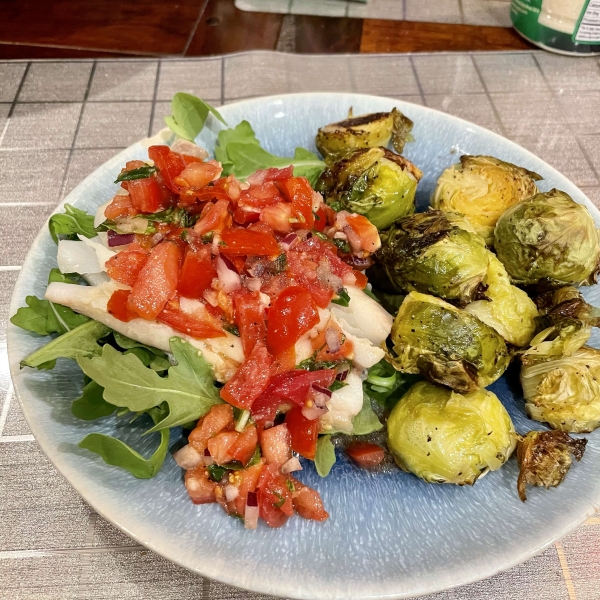 Parmesan Black Cod with Arugula and Tomato Topping