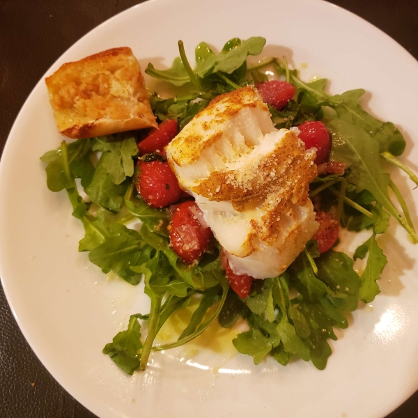 Parmesan Black Cod with Arugula and Tomato Topping