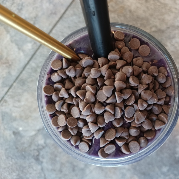 Protein Smoothie Bowl with Berries, Chocolate Chips, and Granola