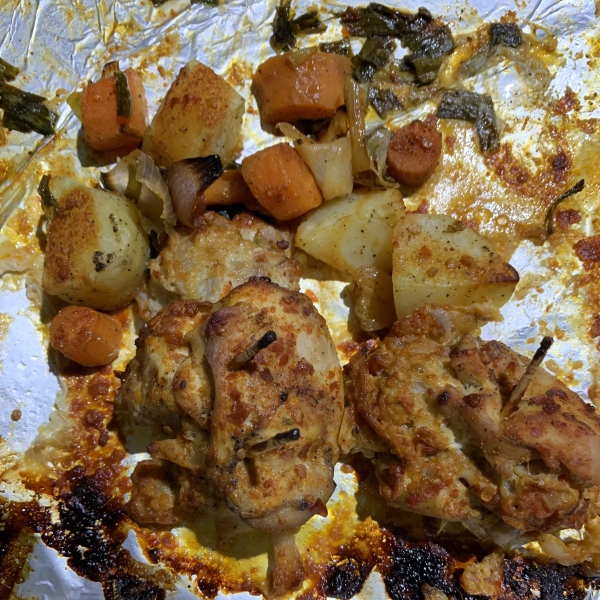 Stuffed Chicken Thighs with Roasted Potatoes and Carrots
